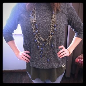 Gold multi-chain necklace with blue/purple beads